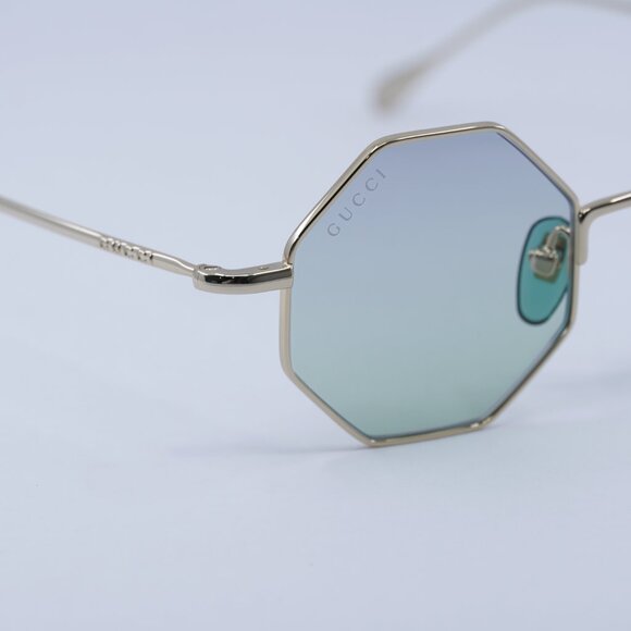 Gucci GG1814S 004 Sunglasses Gold Geometric Frame, Blue Lenses main image 7